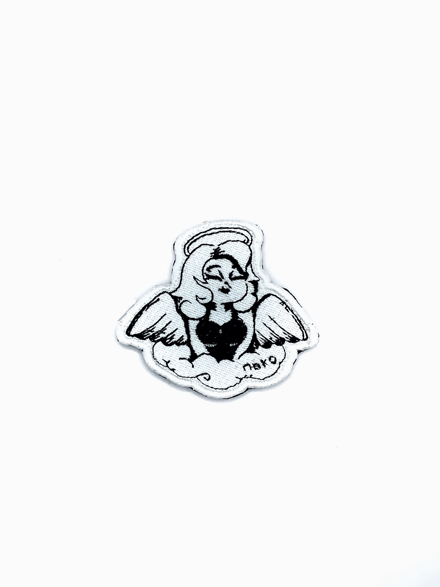 Патч Дівчина-янгол, "Капхед"